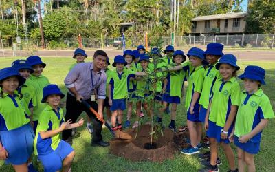 Alderman Jimmy Bouhoris and Year 3/4 Vavlas planting the first tree.